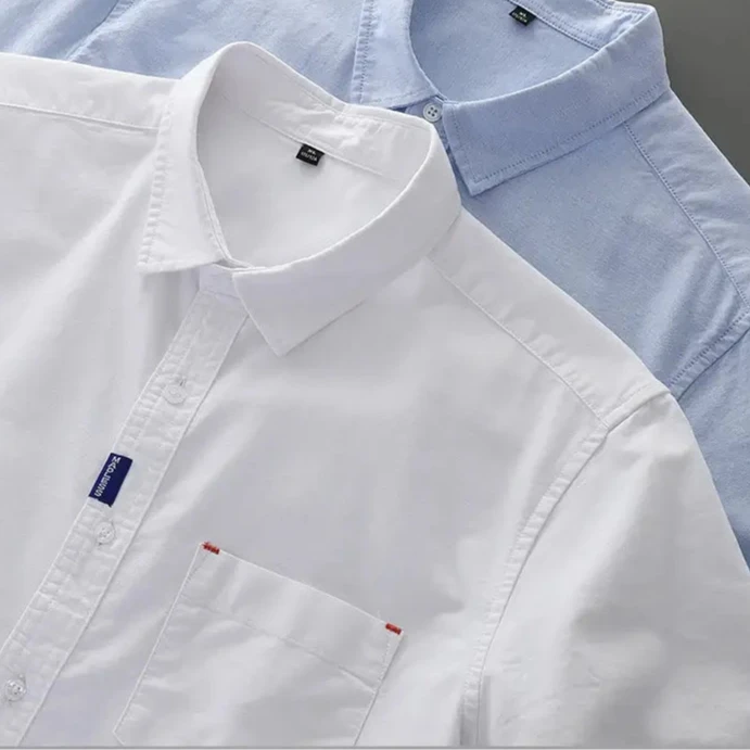 Camisa masculina com fechamento em botões e manga curta, modelagem que se adapta em qualquer corpo.