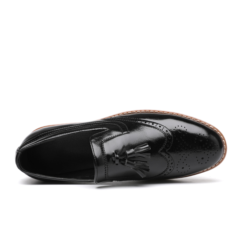 Loafer masculino em couro confortável, modelo social, ideal para uso diário.