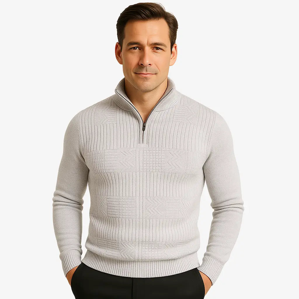 Homem elegante vestindo suéter cinza com zíper e textura geométrica. Estilo casual sofisticado para o outono e inverno.