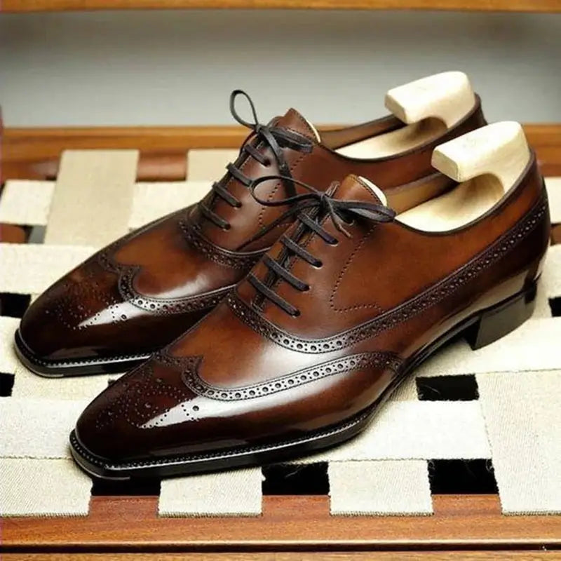 Sapato Masculino Oxford em couro confortável, modelo social, ideal para uso diário e ocasiões especiais.