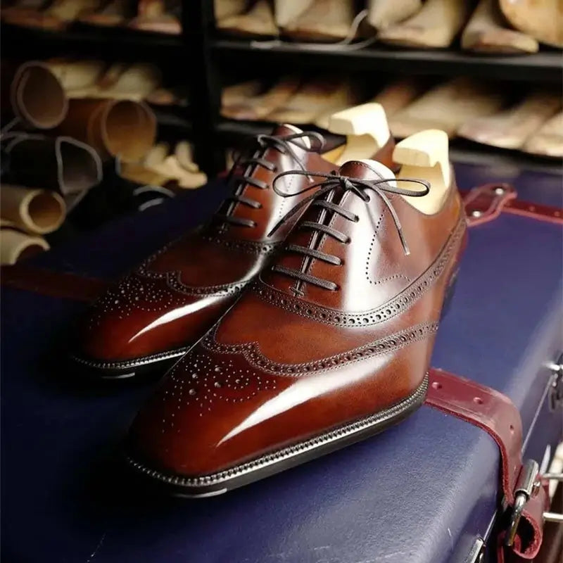 Sapato Masculino Oxford em couro confortável, modelo social, ideal para uso diário e ocasiões especiais.