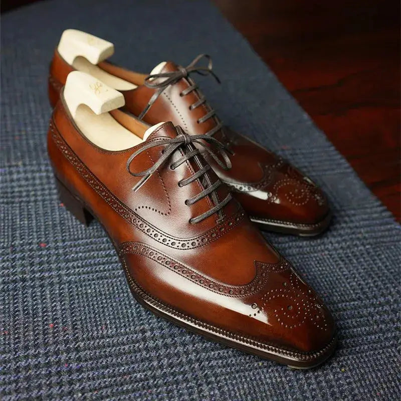 Sapato Masculino Oxford em couro confortável, modelo social, ideal para uso diário e ocasiões especiais.
