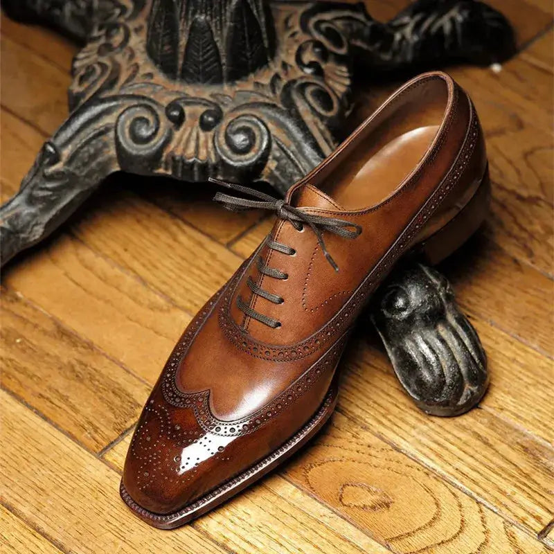 Sapato Masculino Oxford em couro confortável, modelo social, ideal para uso diário e ocasiões especiais.