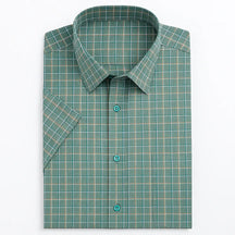 Camisa Xadrez Masculina Oxford Genova em algodão premium, manga curta, padrão xadrez verde com bege, estilo casual elegante.