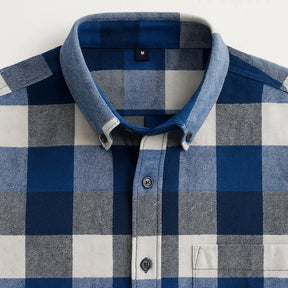 Camisa masculina flanelada xadrez azul royal, manga longa, 100% algodão, bolso frontal e gola com botão.