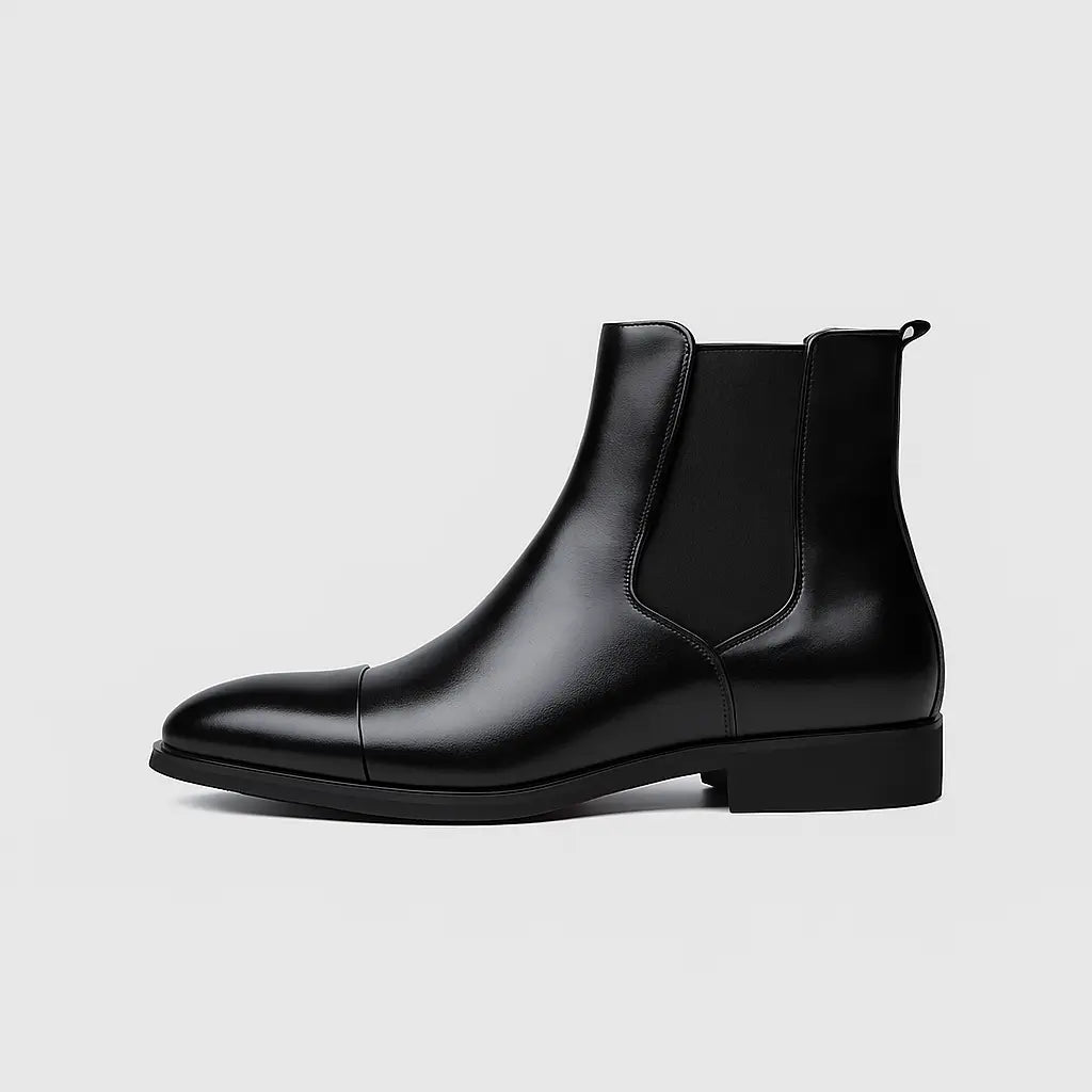Bota Chelsea masculina preta com sola vermelha em couro premium, vista lateral e detalhe da sola