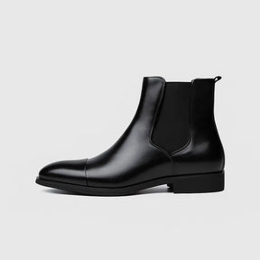 Bota Chelsea masculina preta com sola vermelha em couro premium, vista lateral e detalhe da sola