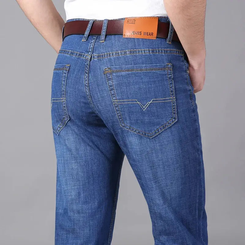 Calça Jeans Masculina Estilo casual formal Seu design sofisticado com modelagem reta proporciona um visual moderno, perfeito para ambientes corporativos e encontros casuais.