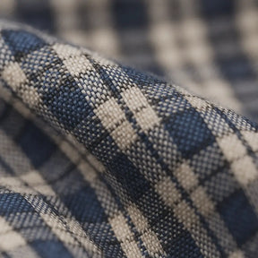 camisa masculina xadrez azul, preto e branco em algodão com poliéster, manga longa, gola estruturada e botões escuros