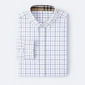 Camisa masculina Oxford xadrez slim fit em algodão premium, manga longa, gola estruturada e padrão quadriculado azul.