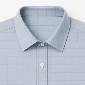 camisa social masculina slim fit cinza claro em algodão com elastano, manga longa, padrão xadrez discreto e gola estruturada
