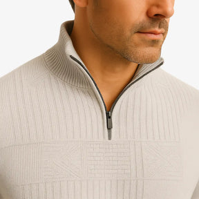 Homem elegante vestindo suéter cinza com zíper e textura geométrica. Estilo casual sofisticado para o outono e inverno.