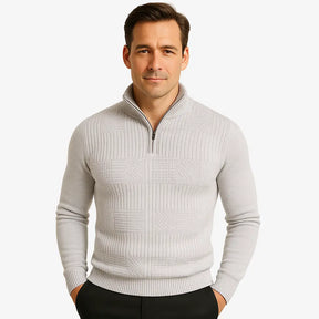 Homem elegante vestindo suéter cinza com zíper e textura geométrica. Estilo casual sofisticado para o outono e inverno.