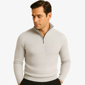 Homem elegante vestindo suéter cinza com zíper e textura geométrica. Estilo casual sofisticado para o outono e inverno.