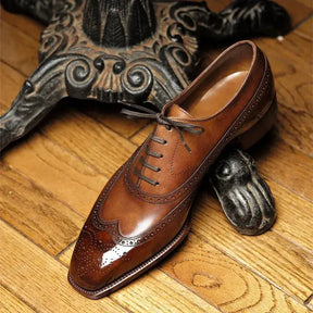 Sapato Masculino Oxford  em couro confortável, modelo social, ideal para uso diário e ocasiões especiais.