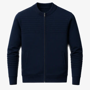  suéter masculino azul marinho com zíper e detalhe em relevo no peito, gola careca canelada e bolso lateral, ideal para outono/inverno.